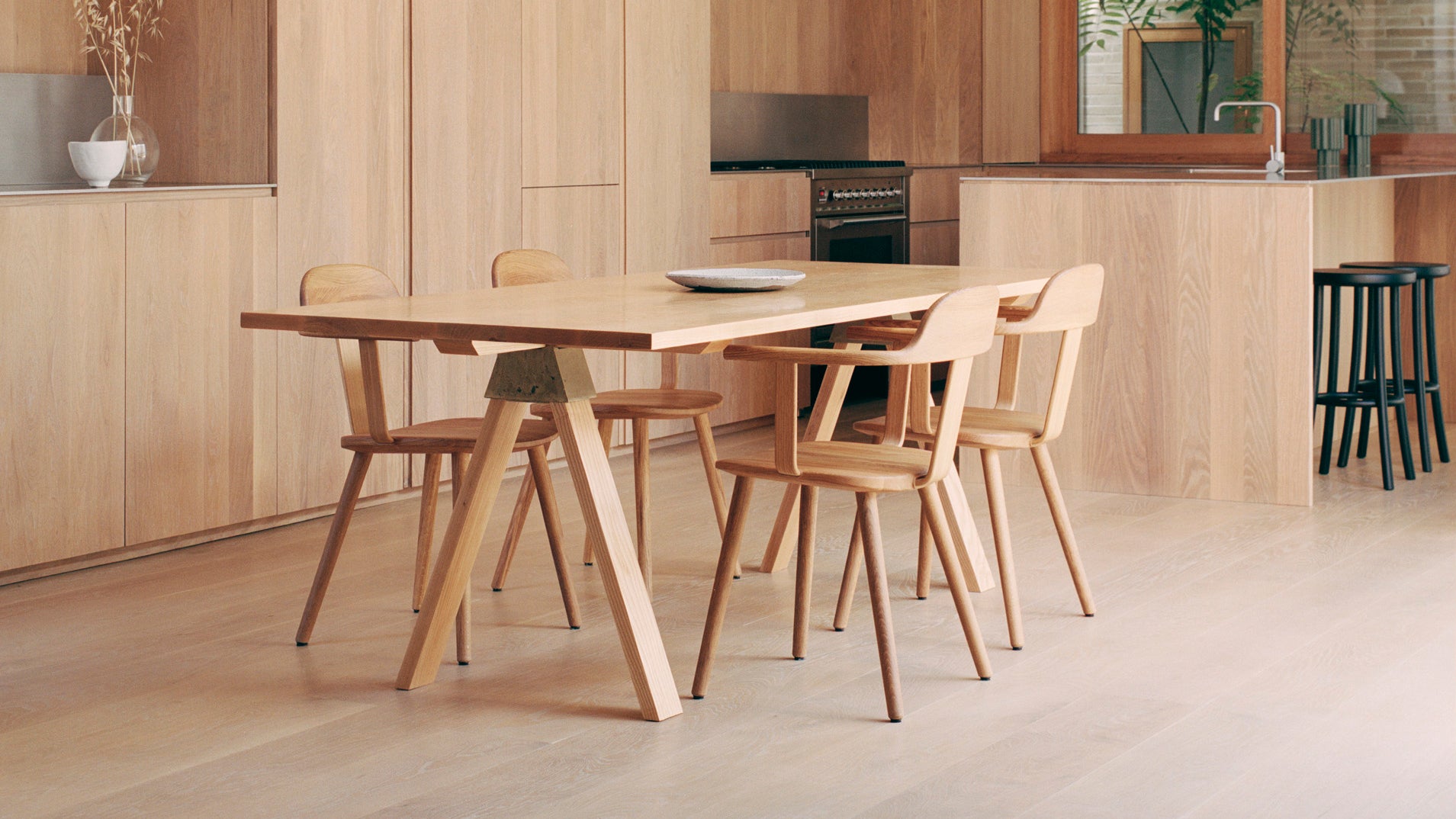 A-joint dining table in solid oak with bronze A-joint
